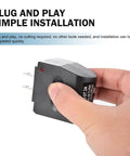 Hand holding Dead Set Reliable 220V AC To DC Power Converter Waterproof Flame Retardant Cigarette Lighter Adapter Plug In And Roll.