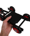 Amosfun Motorcycle Tire Dolly Tool With Five Smooth Wheels Heavy Duty Vehicle Mover, held in hand, compact design for easy transport.