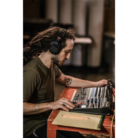 Person using LiveTrak L12 Mixer Multitrack Recorder For Musicians And Podcasters 12 Input 14 Channel USB Audio Interface