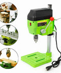 Powerful 480W Mini Bench Drill Press Machine With Dual Speed Settings Up To 11000 RPM for precise drilling in wood, plastic, and metal.