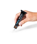 Hand holding Light Gray Tile Repair Filler And Touch Up Paint For Porcelain Tiles And More, Ultra Durable Nanotech Formula, Easy Fix