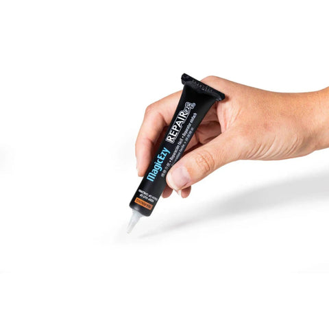 Hand holding Light Gray Tile Repair Filler And Touch Up Paint For Porcelain Tiles And More, Ultra Durable Nanotech Formula, Easy Fix