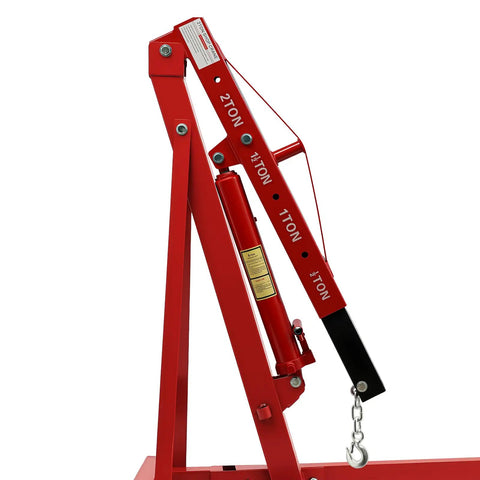 Heavy Duty Hydraulic Engine Hoist, 2 Ton Folding Shop Crane with red metal frame and lifting arm for vehicle maintenance.
