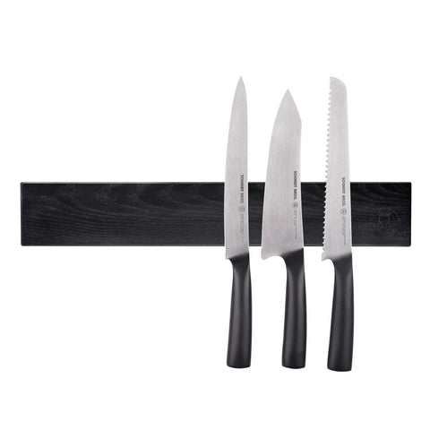 Ultra Strong Neodymium Magnet N42 Block holding three knives on a black magnetic strip for kitchen organization