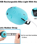 Blue 2 In 1 Kids Bike Lights And Horn Set For Night Rides with USB charging and elastic rubber strap, headlight detail visible.