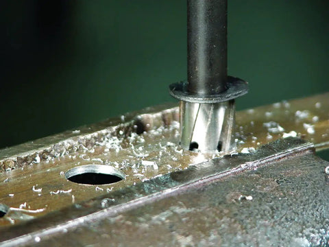 RotaCut Hole Cutter Master Kit in use on sheet metal, creating a clean burr-free hole with precision cutting depth.