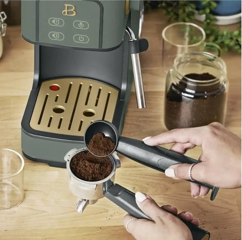 Rock Solid Compact Espresso Machine In Fresh Thyme Green with portafilter and freshly ground coffee on countertop.