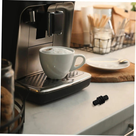 Replacement Heat Insulation Tube For Steam Wand Sturdy Rubber Material Easy Install Keeps Your Espresso Machine Safe To Touch And Temps On Point Durable Upgrade For Your Coffee Gear placed next to espresso machine on counter