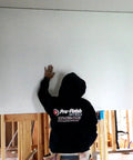 Person installing drywall using Drywall Buddy Tool Set Of 2 For Easy And Safe Wall And Ceiling Drywall Fitting And Support Built Tough With Durable ABS High Strength Plastic Pro Contractor Grade One Or Two Person Operation.