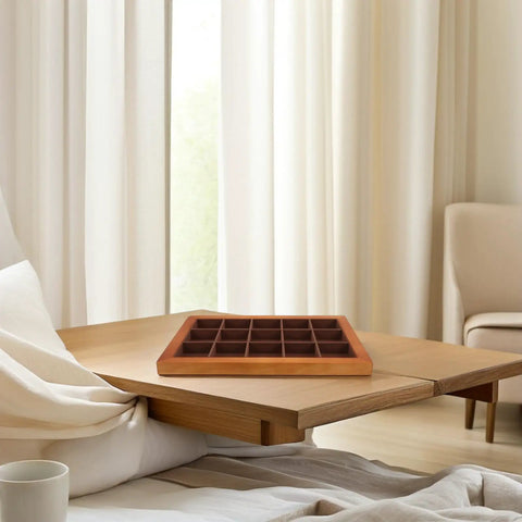Top Shelf Solid Walnut Wood Jewelry Tray Organizer With Fifteen Grids For Rings Necklaces And Bracelets Compact Vanity Storage Display Plate For Counters on a wooden table.