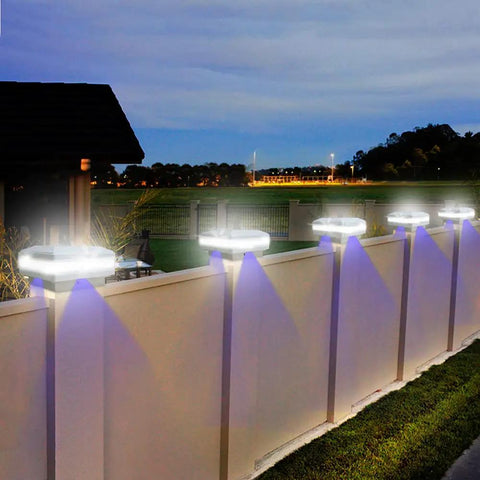 Fence illuminated by 4x4 Solar Post Cap Light No Hassle Easy Install With 52 LEDs, 160 Lumen Outdoor Deck Lights For 3.5x3.5 Posts