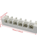 Six-position porcelain terminal block with screw terminals; front-angle view on white base