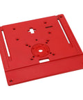 Superior Router Table Insert Plate Made To Swap Straight Into Jig Saws And Wood Trimmers, red plastic base with guide scale.