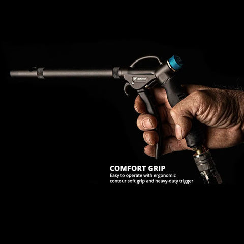 Hand holding Windstorm EX High Performance Air Blow Gun with ergonomic grip, adjustable airflow, extended nozzle for debris blasting.