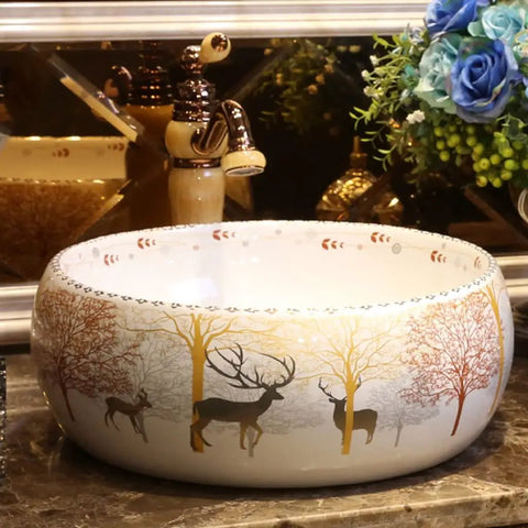 USZWBY Vessel Sinks Bathroom Vessel Sink Nordic Round Ceramic Washbasin Forest Art Countertop Basin Utensils with Faucet Bathroom Bowl Sink featuring deer and tree design.