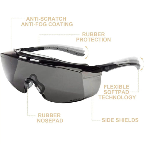 OTG Safety Goggles For Glasses Wearers With Smoke Tint Anti Fog Lenses UV400 Protection Impact Resistant Design Integrated Side Shields Lab Grade ANSI Z87.1 Plus Goggles with anti-scratch coating and rubber nosepad.