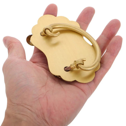 Hand holding Vintage Brass Drawer Handles Two Hole for Chinese Style Furniture Bookcases Cabinets Home Decor Retro Hardware