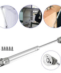 Heavy Duty 10 Inch Gas Spring Strut Lift Support With Brass Cover And Fixing Plate For Cabinet Doors showing installation angles and screws.