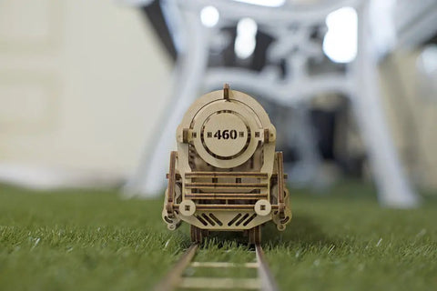 3D Model Steam Locomotive Kit With Tender For Builders And Hobbyists, Gear Driven Train Replica With Rubber Motor, Vintage Steam Era Style For DIY Railfans And Train Nerds, front view