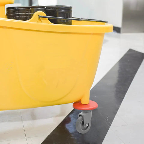 4 Piece Heavy Duty Rubber Swivel Caster Wheels With Threaded Stem And Spring Loaded Setup For Slick Rolling On Mop Buckets Trash Dolly Furniture Carts Grey on a yellow mop bucket
