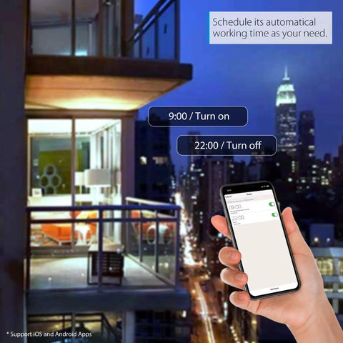 Hand holding smartphone controlling BR30 Smart LED Flood Bulbs 13W 1300 Lumens RGB from a balcony with city view at night.