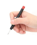 Hand holding red-tipped pen from Watch Oiler Pen Set Three Piece With Stand For Watchmakers Automatic Precision Oil Pens Lubricating Movement Parts