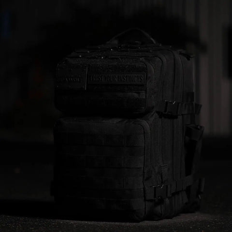 25L Tactical Gym Backpack Nightshade Edition With 1000D Waterproof Oxford Fabric, MOLLE Webbing, nighttime view