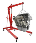 Heavy Duty 2 Ton Hydraulic Engine Hoist Cherry Picker Shop Crane With Telescopic Boom and Dual Wheel Casters lifting an engine