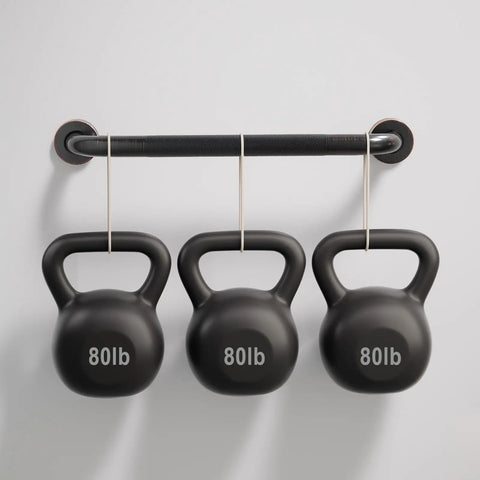 Built Tough Sixteen Inch Oil Rubbed Bronze Shower Grab Bar Wall Mounted Rustproof Stainless Steel Bathroom Safety Rail With Heavy Duty Grip And Killer Anti Slip Finish showcasing kettlebells hanging on a bar.