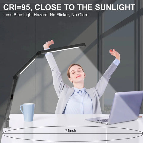 Led Desk Lamp With Dual Light Source And Adjustable Swing Arm Clip On Eye Care Desk Light With 4 Cct Modes And 5 Brightness Levels Architect Style Task Light For Your Home Office Or Study Setup positioned beside a relaxed person stretching at a desk.
