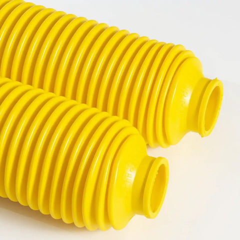 Hella Heavy Duty Yellow Fork Bellows Rubber Suspension Boot Built Tough To Shield Your Rig From Dust And Gunk in close-up view.