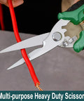 Tough As Nails Heavy Duty Tin Snips And Industrial Scissors With Serrated Stainless Blade cutting red wire cable.