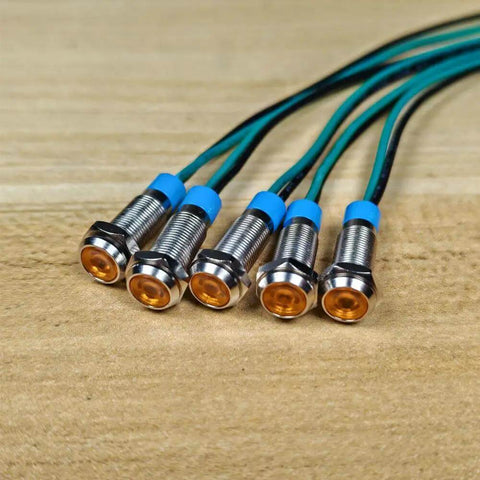 Orange LED Indicator Lights 3V To 9V DC Waterproof Panel Mount Signal Lamp Kit 5 Pack with wires on wooden surface
