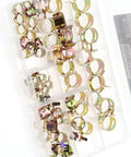 Top Notch 60 Piece Assortment Kit Featuring Super Durable Silicone Spring Band Clamps In 6 Through 15 mm Sizes Perfect For Fuel Lines Vacuum Pressure Tasks Air Intakes And Auto Repair Jobs To Keep Everything Snug And Sealed Tight. Assorted metal spring hose clamps in a clear storage case.