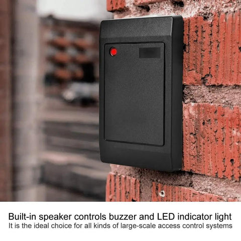 Door Access Card Reader 26 To 34 Channel 125KHz RFID ID Card Reader mounted on brick wall for home security and outdoor access control.