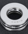 Close-up of axial ball thrust bearing 51204, 5/8 bore, silver metal