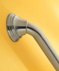 Close-up of 16 Inch Stainless Steel Grab Bar For Bathtub And Shower With Concealed Screws Brushed Nickel Finish Heavy Duty Support Up To 500 Lbs SecureMount Style For Easy Installation against yellow wall.