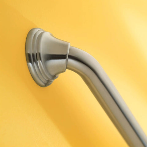 Close-up of 16 Inch Stainless Steel Grab Bar For Bathtub And Shower With Concealed Screws Brushed Nickel Finish Heavy Duty Support Up To 500 Lbs SecureMount Style For Easy Installation against yellow wall.