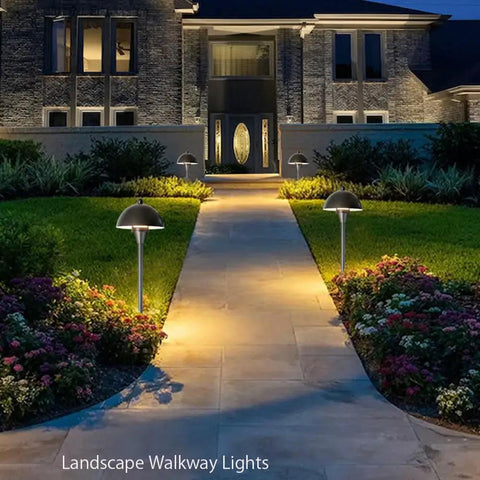 Go To Low Voltage G4 LED Path Lights For Outdoor Landscape Lighting In Oil Rubbed Bronze With Warm White Glow illuminating a walkway