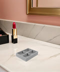 Premium Solid Go-To Velvet Jewelry Tray, Four Secure Grid Dividers, stackable mini plate on marble countertop.