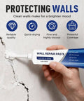Image of a person using All In One Drywall Repair Kit With Scraper For Quick Patch Up And Hole Crack Fix No Mess Mending Paste Includes Two 250g Tubes Nozzle Extender Sandpaper And Durable Scraper For Easy DIY Home Repairs to fix a wall crack.