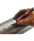 Worker using Marker Paint Jobsite Liquid White 48-22-3711 Pro Grade White Marking Marker For Construction Sites Quick Dry Durable Finish on metal