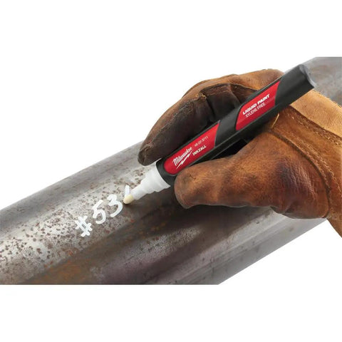 Worker using Marker Paint Jobsite Liquid White 48-22-3711 Pro Grade White Marking Marker For Construction Sites Quick Dry Durable Finish on metal