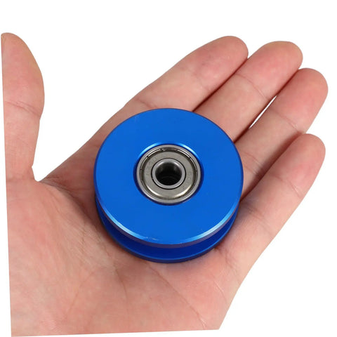Aluminum U Groove Pulley Wheel With Heavy Duty Silent Roller And Double Bearings For Fitness Equipment And Home Gym Cable Systems For Durable Gym Pulley Wheel To Improve Smooth Quiet Workouts, blue in hand