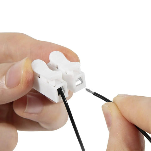 Close-up of Harness Disable Kit For Honda And Acura 3.5L V6 Engines To Disable VCM with white connector and black wire.