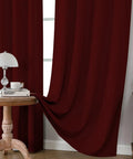 Burgundy Red Blackout Curtains 96 Inch Long 2 Panels Rod Pocket Window Drapes Darkening Thermal Insulated Light Blocking For Bedroom And Living Room W52 X L96 hanging in a living room.