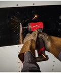 Person using Top Tier Quarter Inch Cordless Right Angle Die Grinder With Brushless Motor And Snappy Trigger for grinding metal.