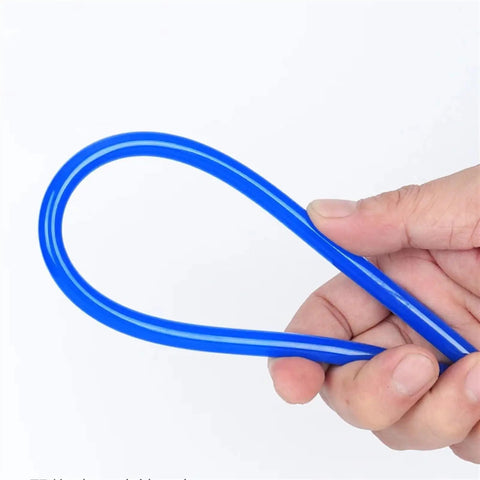 Top Shelf Badass Black Pneumatic Air Compressor Hose 4mm PU Tubing 20 Meter Long Length For Tools Heavy Duty Jobs Flexible Strong Material Works Great In Shop Or Garage Settings Prevents Leaks Or Twisting Issues During Use All Day Long, blue 4mm PU air hose held in hand