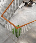 Hella Sturdy White Stainless Steel Stair Spindles For Deck And Porch, 25 pack, modern railing design with wood handrail.