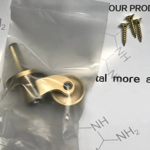Retro Polished Brass Furniture Casters 25Millimeter Swivel Wheel Rollers For Kitchen Cupboards And Cabinets Featuring Heavy Duty Screw Mounts in packaging with screws.